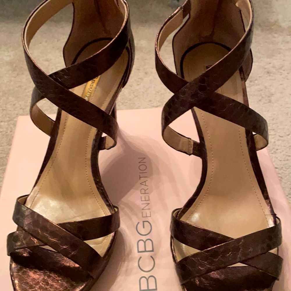 BCBGeneration dark brown glossy snake heels
